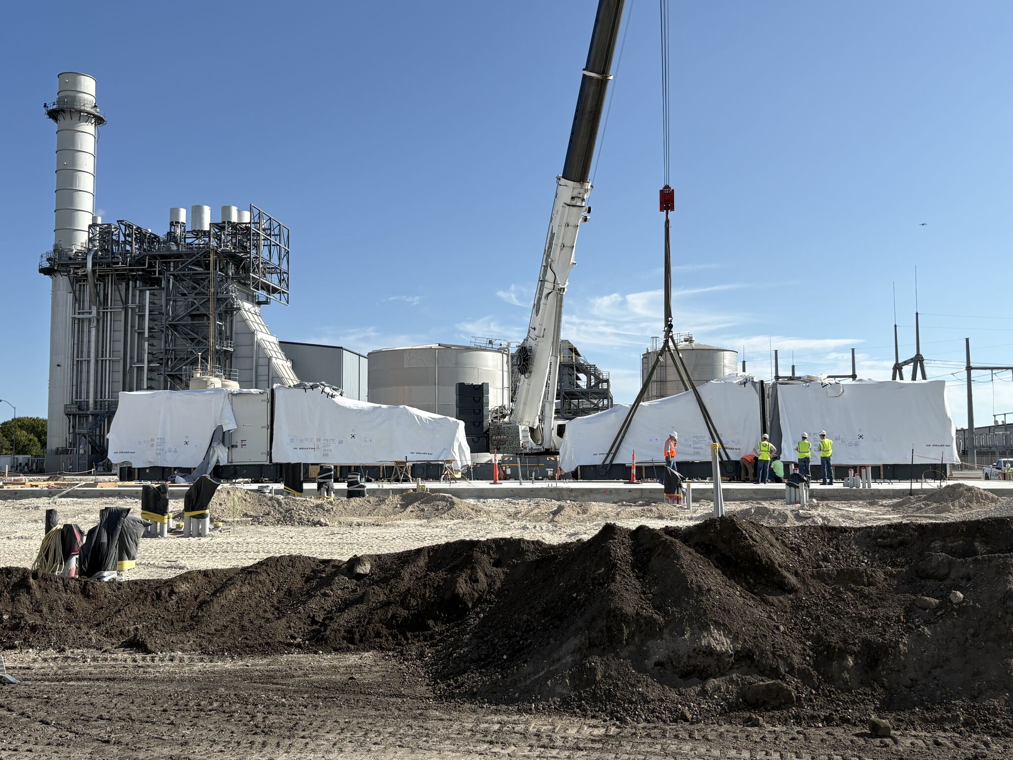ECA electricians on a job site representing end-to-end expertise